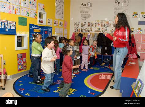 Preschool children dancing in the classroom Stock Photo - Alamy