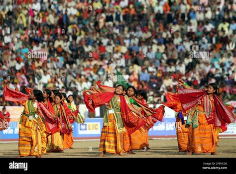 India's Bodo tribal women in their traditional costumes perform Bagrumba dance during the ...