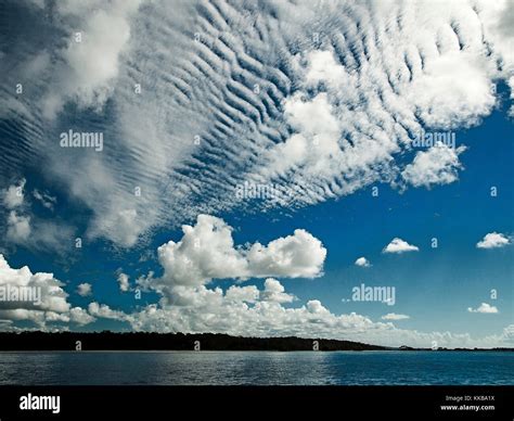 A spectacular inspirational brightly coloured cloudy sea water tropical ...