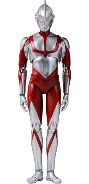 A Red And Silver Robot Standing In Front Of A White Background