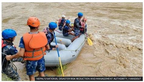 Dozens Missing As Landslide Sweeps Buses Into Nepal River