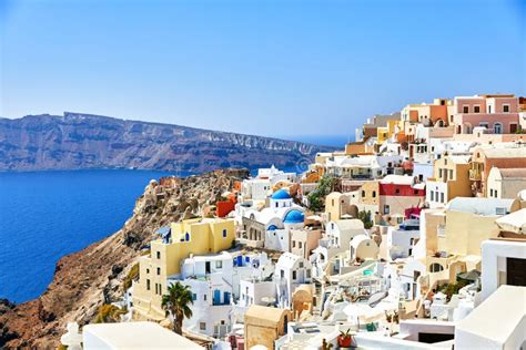 White Houses with Blue Roofs on Santorini Stock Photo - Image of ...