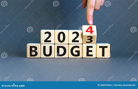 Planning Budget New Year Symbol Businessman Turns A Wooden Cube