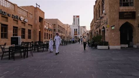 Souq Waqif Doha Qatar Main Street At Sunset Showing Restaurants And