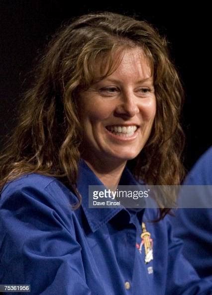 Endeavour Mission Specialist Tracy Caldwell Smiles After A Comment