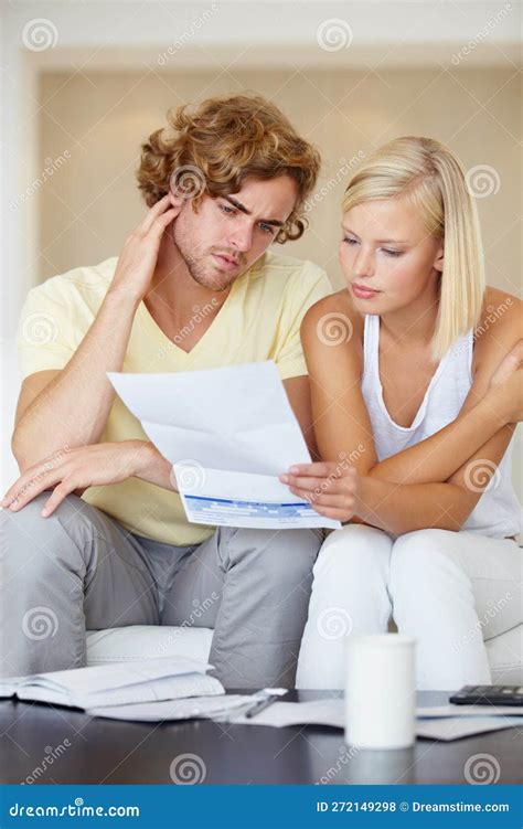 Financial Planning Is Important A Young Couple Reading A Financial