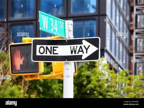 One way traffic sign on the West 34 Street in New York City, selective ...