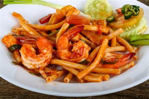 Spicy Pasta with seafood Stock Photo by ©AndreySt 100656976