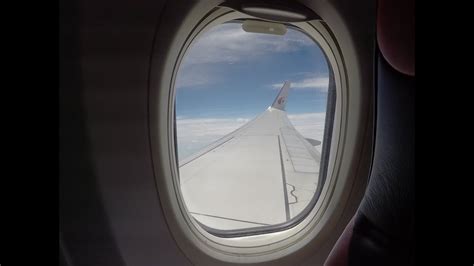 Malaysia Airlines Boeing 737 Flying Over The Blue Sky And Clouds A View From The Window Youtube