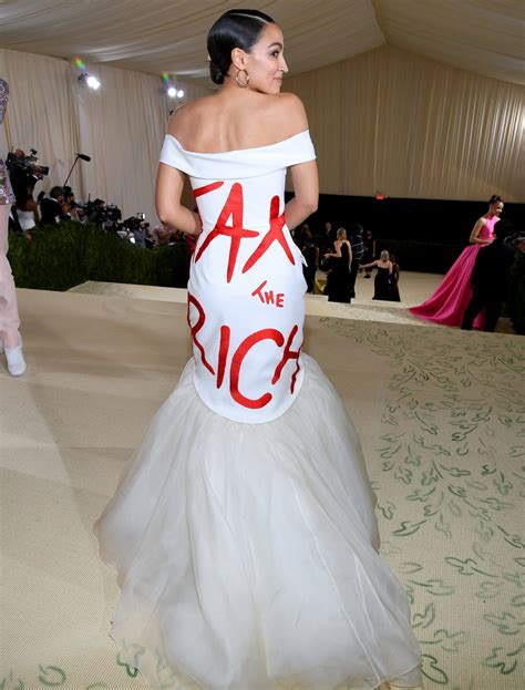 AOC Wears "Tax The Rich" Dress to Met Gala - The Outlook