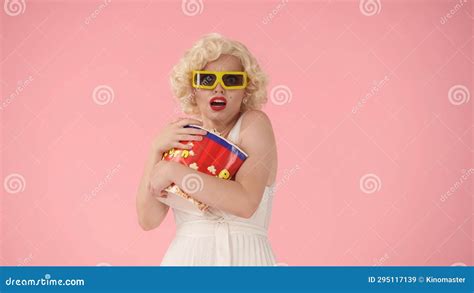 Portrait Of A Scared Woman Wearing 3d Glasses And Holding A Big Bucket