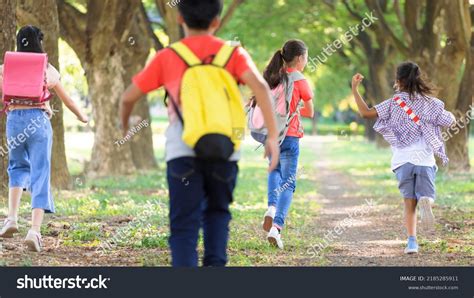 Rear View Elementary School Kids Running Stock Photo 2185285911