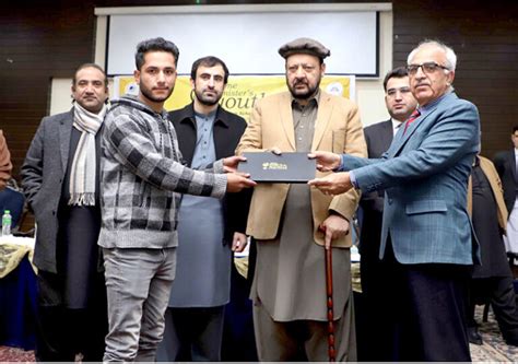 Chief Minister Gilgit Baltistan Haji Gulbar Khan Giving Away Laptops To