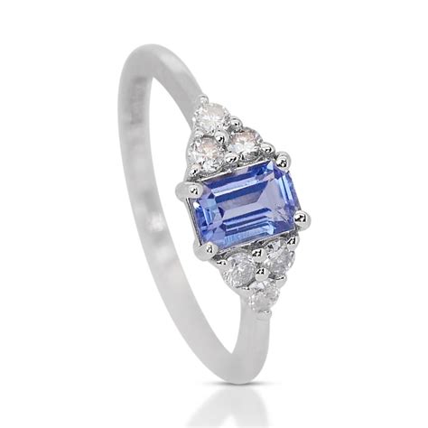 Mesmerizing 0 81ct Tanzanite Pave Ring With Side Diamonds In 18K White