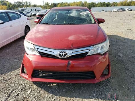 Report 4t1bf1fk4eu834578 Toyota Camry 2014 Red Gas Price And Damage