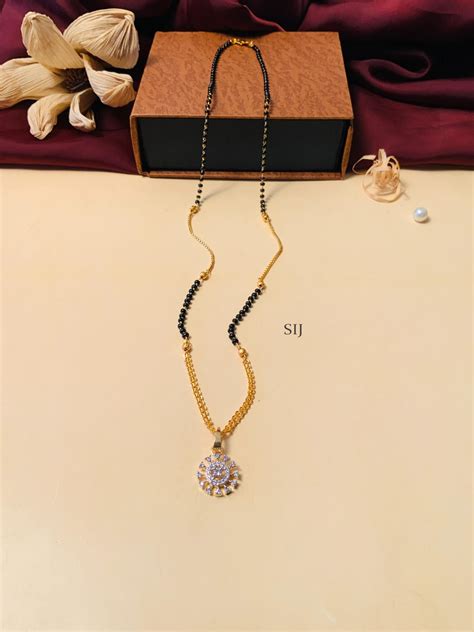 Artificial Black Beaded And Gold Plated Solitaire Diamond Mangalsutra