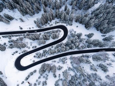 Premium Photo Aerial View Of Winding Road In Winter