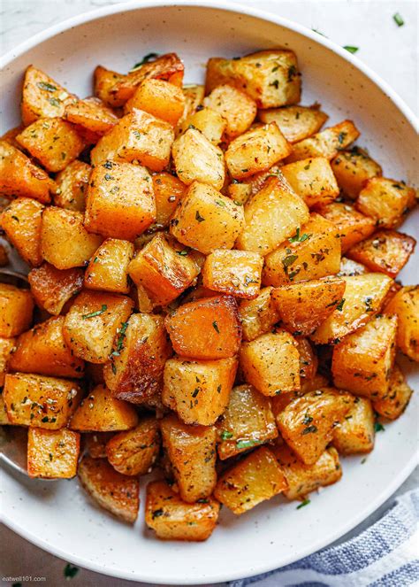 Garlic Roasted Potatoes Recipe Roasted Potatoes In Oven Eatwell101