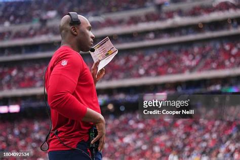 Houston Texans head coach DeMeco Ryans looks on against the... News ...