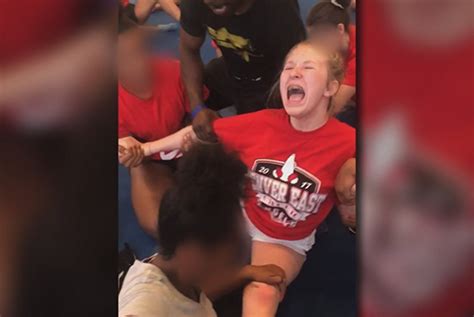 See It Disturbing Video Showing High School Cheerleader Forced Into Split By Coach Sparks