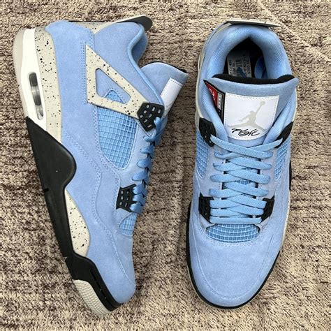 Air Jordan 4 Retro University Blue... - Depop