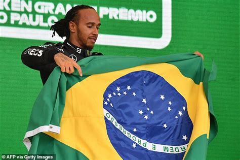 Lewis Hamilton Given 21 000 Fine For Taking Seatbelt Off To Get Brazil