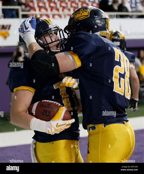 Reginas Jake Brinkman Right Congratulates Riley Dixon After A