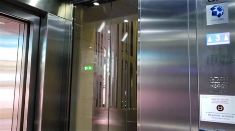 Thyssenkrupp Glass Traction Elevators Dubai Airport Youtube