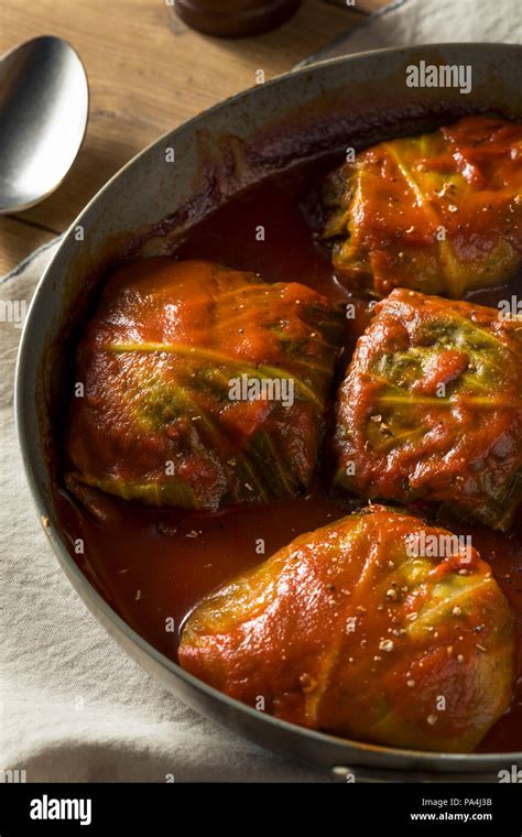 Homemade Beef Stuffed Cabbage Rolls with Tomato Sauce Stock Photo - Alamy