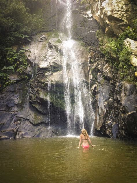 Yelapa Mexico, Sexy woman bathing at waterfalls stock photo