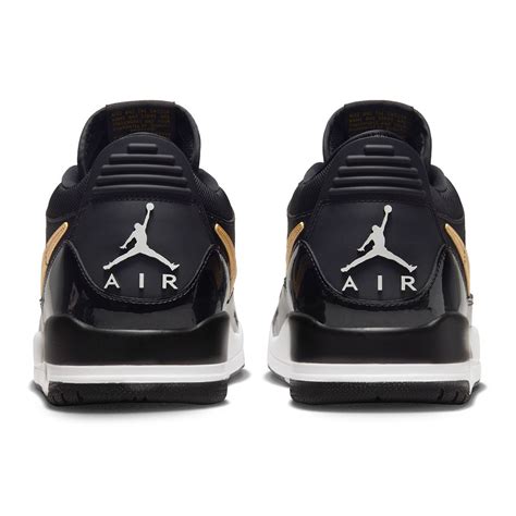 jordan men air jordan legacy 312 low black metallic gold white