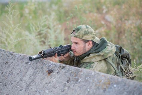 professional airsoft player aims   opponents stock image