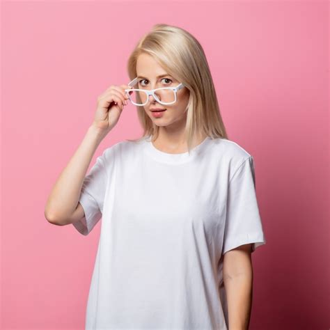 Premium Photo Blonde Woman In White Tshirt And Glasses