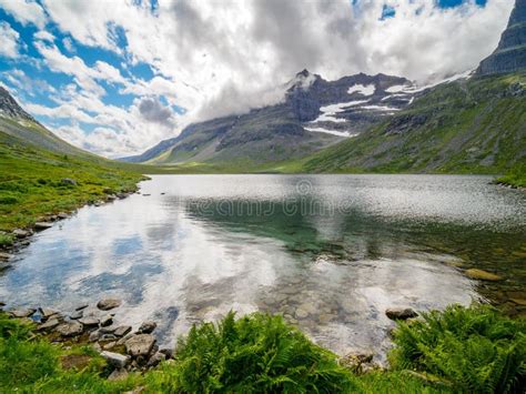 Storvatnet Lake And The Mountain Peaks Surrounding Innerdalen Mountain