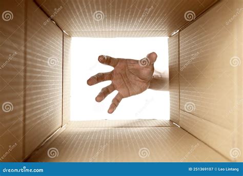 View Of The Inside Box With Hand Taking Something Stock Image Image