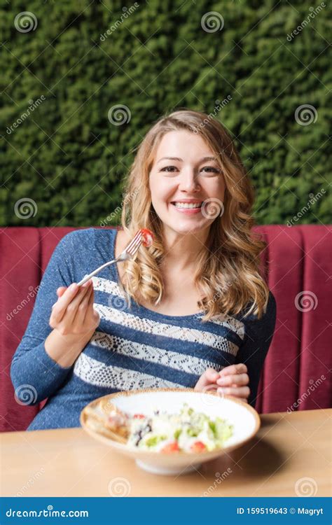 Blonde Pretty Woman Eating Salad Client Tasting Delicious Meal In A