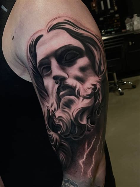 Jesus Face Statue Tattoo