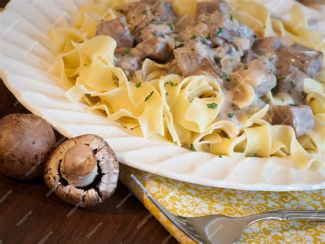 Premium Photo Beef Stroganoff On Egg Noodles