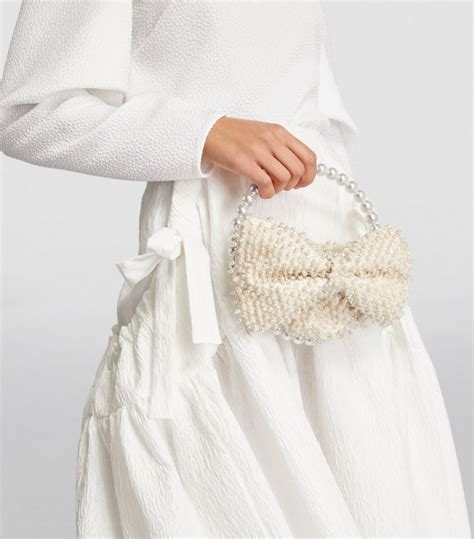 L Alingi Exclusive Pearl Embellished Bow Clutch Bag Harrods Us