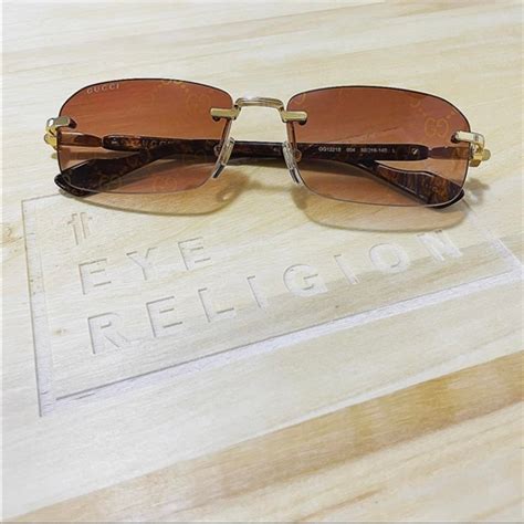 Gucci 1221 Hologram Rimless Sunglasses