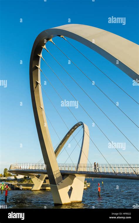 The Elizabeth Quay Pedestrian Bridge On The Swan River At Sunset Perth