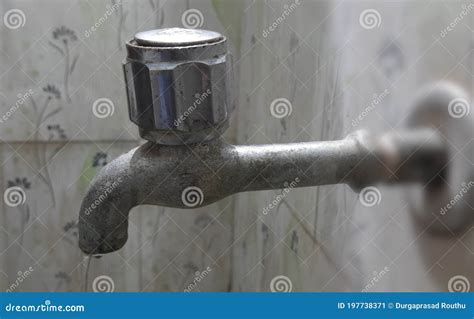 Old Bathroom Sink Faucet Contaminated With Calcium And Grime Hard