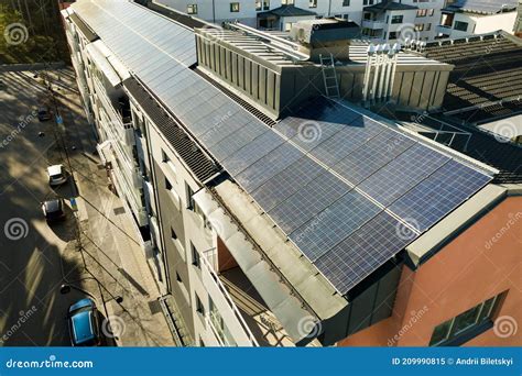 Aerial View Of Solar Photovoltaic Panels On A Roof Top Of Residential