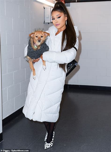 Ariana Grande Shows Puppy Love With Her Dog Toulouse As She Serves