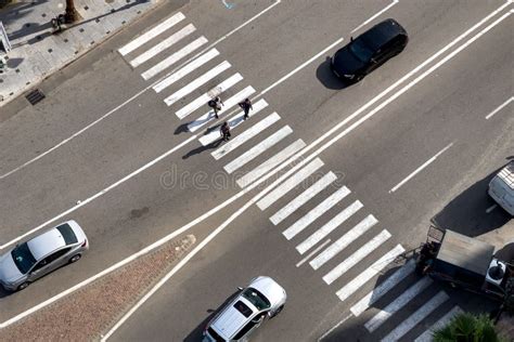 Aerial View of Pedestrians Crossing the Zebra Lines Stock Image - Image ...