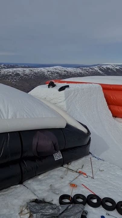 Skier Attempting Jumping Trick Falls On Snow Platform After Missing