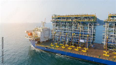 Tender Drilling Oil Rig on Barge Ship transportation Rid to Oil Rig in ...