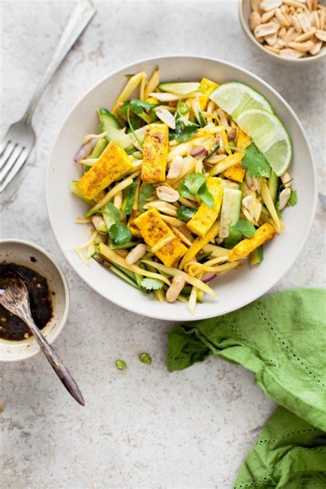 Sinfully Spicy Green Mago And Curried Tofu Salad With Coocnut Sugar Ginger Dressing Vegan