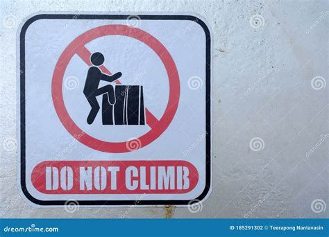 Do Not Climb Sign On Concrete Fence Stock Photo Image Of Climbing