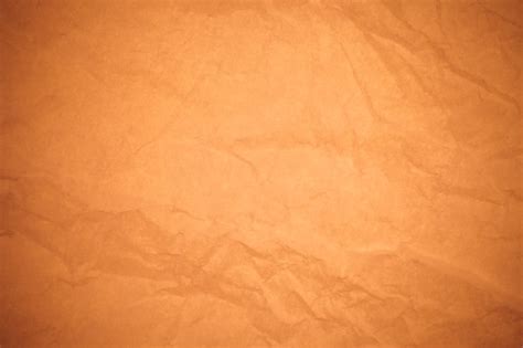 Premium Photo Crumpled Brown Paper Background